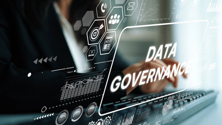 Professional Businesswoman Engaging in Data Governance Management with Digital Analytics in Modern Workspace. Asymptotic smart data analytic.の写真素材