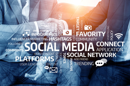 A professional setting showcasing a handshake symbolizing networking in social media marketing, focusing on audience engagement and innovative content creation for online success. Tesselの写真素材