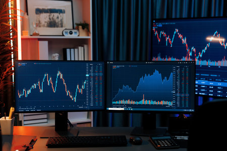 Big screens of dynamic stock market exchange graph showing on computer at neon light night time....