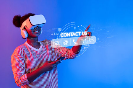 A young Black woman interacts with a virtual help desk while wearing a VR headset. The digital...
