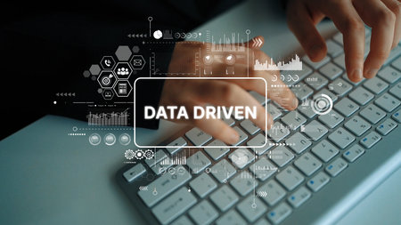 Hands Typing on Keyboard with Data Driven Visualization and Graphical Elements for Technology and Business Background. Asymptotic smart data analytic.の写真素材