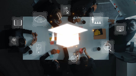 A team of professionals engaged in a strategic meeting around a conference table, with technology...