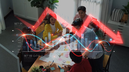 A diverse team collaborates in a modern office space, analyzing data trends through charts and...