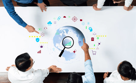 A business team engages in a meeting, analyzing global market trends using digital icons and...