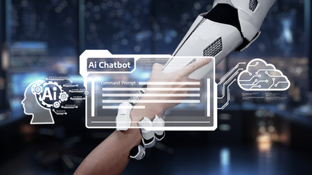 A striking image illustrating a human hand reaching towards a robotic arm, symbolizing the integration of AI chatbots in digital environments and showcasing technological progress.の写真素材