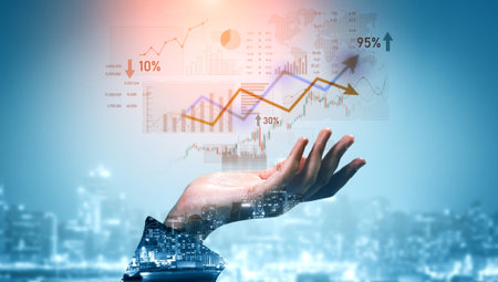A hand reaches towards dynamic digital graphs showcasing financial growth and analytics. This image...