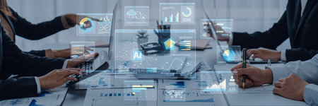 Group of professionals engaged in a business meeting focused on digital analytics, highlighting data...