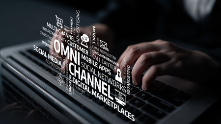 Close-up view of hands typing on a laptop surrounded by various digital marketing concepts, illustrating the importance of omni-channel strategies in modern business. Tesselの写真素材