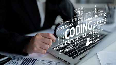 A professional software developer focuses on coding tasks using a laptop, showcasing various...