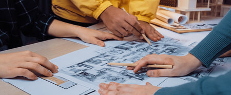 A vibrant scene depicting a collaborative design session where team members engage in planning an...