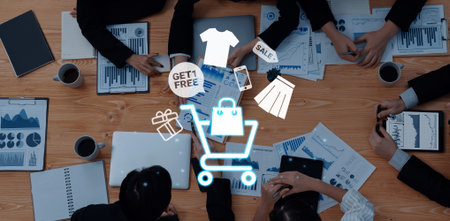 Glowing shopping cart with sale tags, clothing, and mobile items representing online retail marketing and e-commerce promotions Parseの写真素材