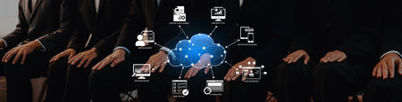 Group of business professionals engaged in conversation about cloud technology and data analytics in...