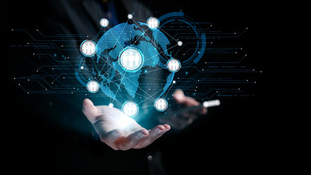 This image features hands holding a digital globe surrounded by network connections and icons,...