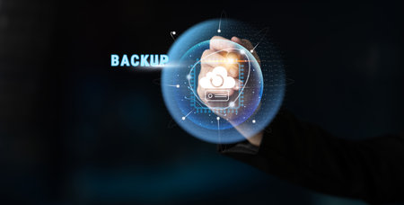 Cloud technology for data backup and disaster recovery solutions. Securely store and restore your critical business information to prevent data loss.の写真素材