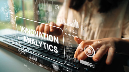 Hands Typing on Keyboard with Futuristic Innovation Analytics Interface Displayed on Screen....