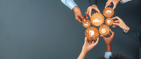 This image showcases a diversity of hands collaboratively holding gears, symbolizing teamwork and strategic management essential for innovative business operations and success.の写真素材
