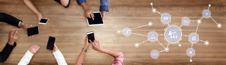 A collaborative work environment featuring multiple hands interacting with smartphones and tablets...