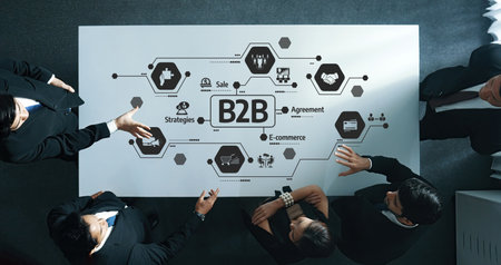 Collaborative Business Strategy Meeting focused on B2B Approaches, E-commerce Trends, Sales Agreements, and Strategic Planning in a Corporate Environment.の写真素材