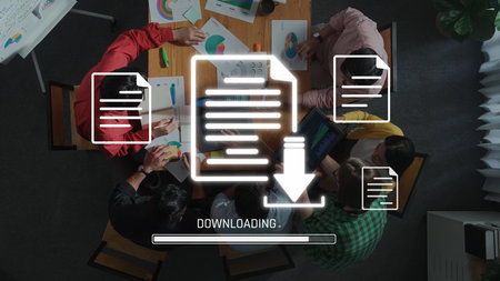 Aerial view of a diverse team engaged in a collaborative meeting, working with charts and documents,...