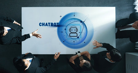 Business professionals engage in a strategic discussion about chatbot technology, highlighting innovation and teamwork in a modern office environment with digital elements.の写真素材