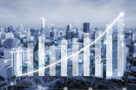 This image showcases financial growth with a graph overlayed on a city skyline. The visual emphasizes business success, investment strategies, and market analysis. Imputeの写真素材