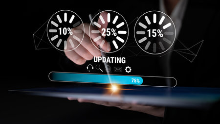 A concept of a system update and software installation. A progress bar and loading icons showing the...