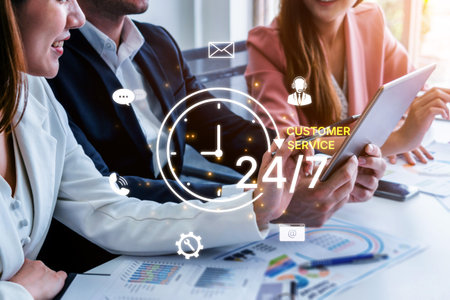 Concept of 24-hour customer service. Providing constant, non-stop support and assistance through multiple channels like phone, email, and chat for customer satisfaction.の写真素材