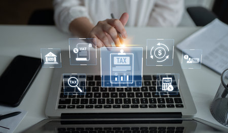 Financial regulation and tax compliance concept showing tax document, VAT, transaction flow, and financial auditing in modern financial systemの写真素材