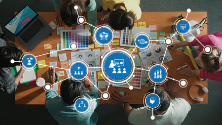 Collaborative Creative Session with Designers Engaging in Teamwork, Brainstorming, and Workflow Visualization.の写真素材