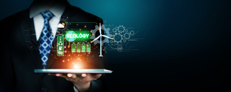 Business person implements green strategies, promoting sustainable growth. Discover how businesses lead with sustainable, green innovations for a healthier planet.の写真素材