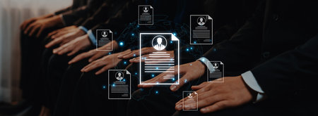 Concept of global talent acquisition and hiring. Human resources department reviewing candidate curriculum vitae and resumes for a job search and workforce selection process.の写真素材