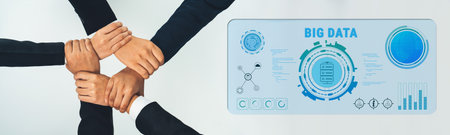 A visual representation of teamwork as diverse hands unite around a digital big data concept,...