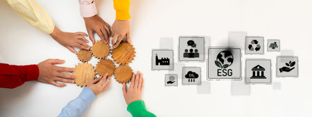 Collaborative Teamwork in Business Setting with Diverse Hands on Wooden Gears Symbolizing ESG Principles, Sustainability and Social Responsibility Initiatives Trope.の写真素材