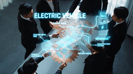 A group of professionals work together in a modern meeting space, analyzing an innovative electric vehicle concept with smart battery systems and electronic components. Rasterの写真素材