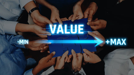 A dynamic representation of teamwork with diverse hands assembling a puzzle piece that signifies the journey of value from minimum to maximum in a collaborative environment. Rasterの写真素材