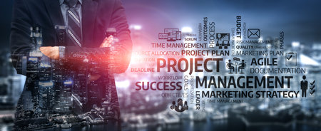 This image captures a businessman in front of a city skyline, highlighting concepts of project management, success, and marketing strategy amidst a dynamic urban backdrop. Tesselの写真素材