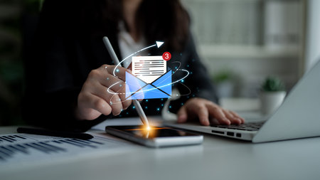 Concept of digital communication and correspondence. Receiving a new message or notification in an email inbox, representing online information exchange and alerts.の写真素材