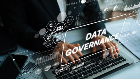 Professional Businessperson Engaging in Data Governance Process with Digital Graphics and Analytics Overlay in Modern Office Environment. Asymptotic smart data analytic.の写真素材