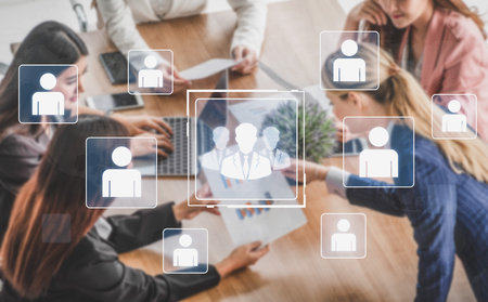 Concept of human resources and organizational structure. A professional team is shown within a corporate network, representing management, leadership, and collaboration.の写真素材