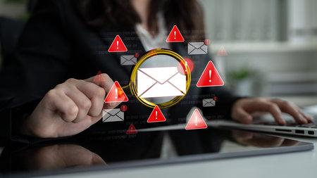 Concept of a cybersecurity warning for unsafe email communication. This alert signifies a phishing...