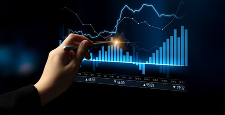 A hand with a pen analyzes a digital stock chart displaying blue graphs and data trends,...