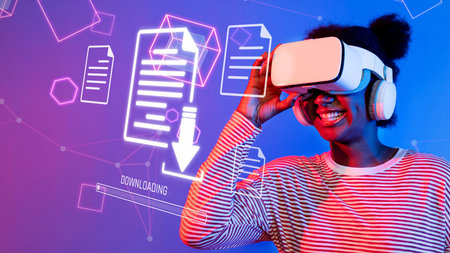 A joyful young woman wears a virtual reality headset, immersed in digital content. The colorful...