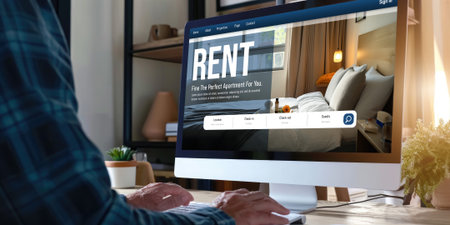 Online real estate rental search brisk on computer. House home or apartment rental website online.の素材