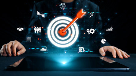 This image portrays a businessman engaging with a digital target amid a futuristic interface, symbolizing strategic planning and data-driven decision-making for business success.の写真素材