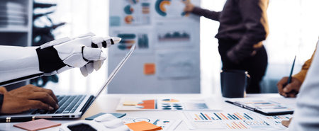 A modern office scene showcasing a robot assistant collaborating with a human team in a business...