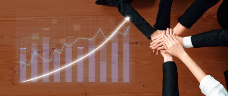 Collaborative teamwork is essential for success. Hands together symbolize unity while a growth chart...