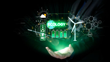 A person holds an innovative visual representation of ecology with icons for renewable energy, wind turbines, and sustainability solutions in a digital format.の写真素材