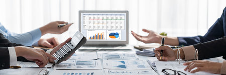 Business intelligence and data analysis concept. Analyst team working on financial data analysis...