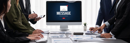 Panorama shot analyst team utilizing BI Fintech to analyze financial report with laptop. Businesspeople analyzing BI data dashboard displayed on laptop screen for business insight.の写真素材