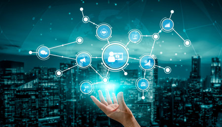 A hand reaches out to touch a glowing virtual interface showcasing a digital network, symbolizing...